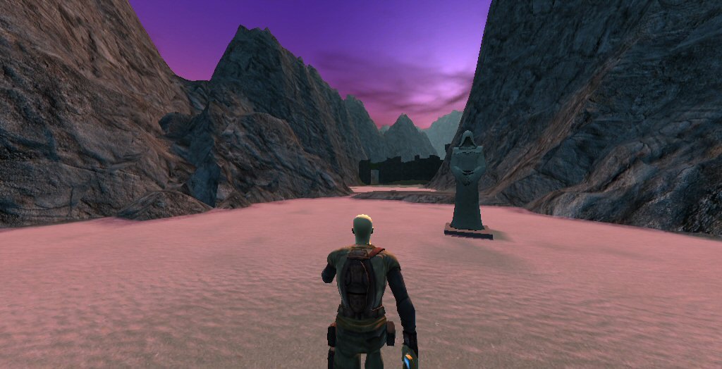 Ancient Galaxy screenshot: the hero walks a pink lakebed between canyon walls toward a hooded statue